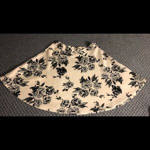 White skirt with dark blue flowers